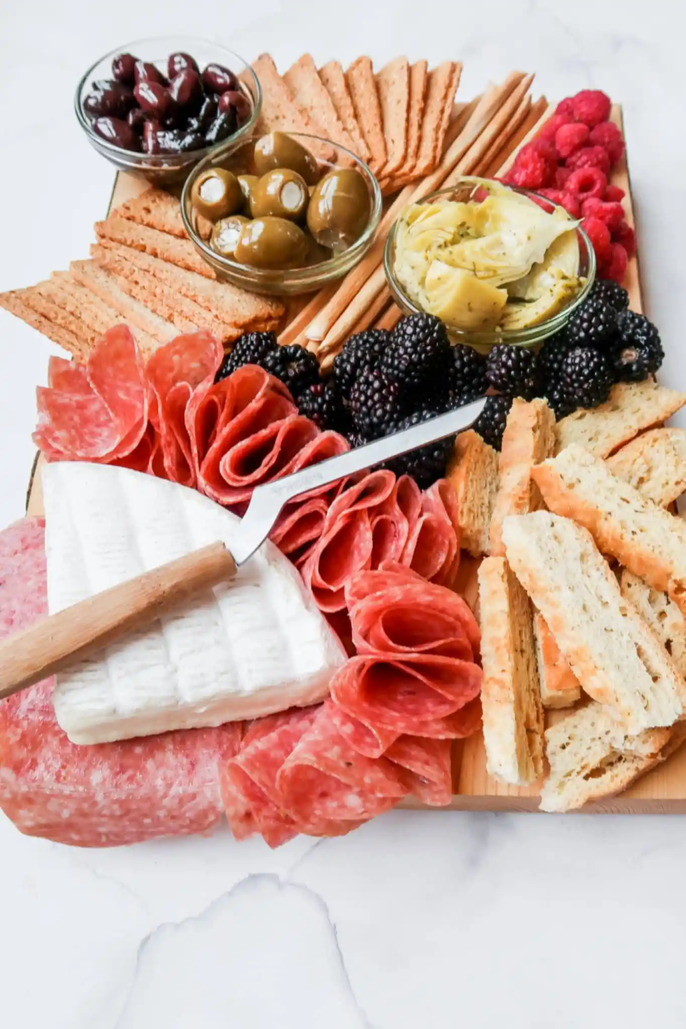 https://www.winewithpaige.com/wp-content/uploads/2022/11/1-Epic-Charcuterie-Board-for-Two.webp