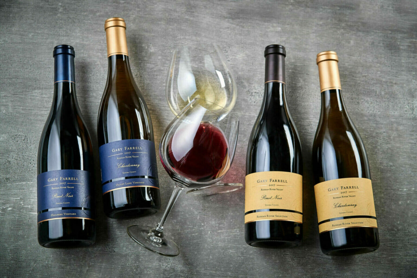Bottles of LGBTQ+wines and wine glasses