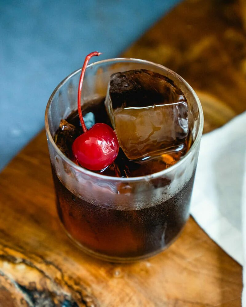 Black-Russian Coffee Cocktails sitting in a glass with cherry