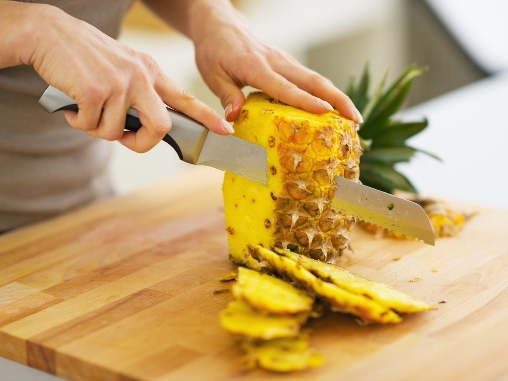 Cutting a Pineapple for Pineapple Tequila