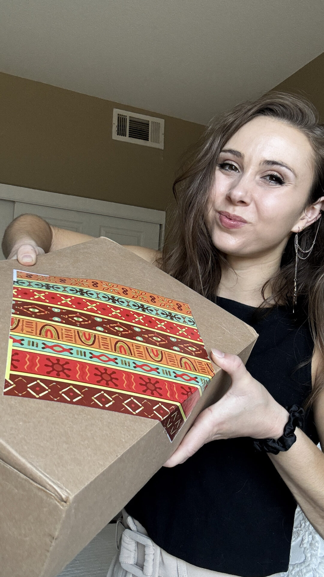 Paige holding My African Box