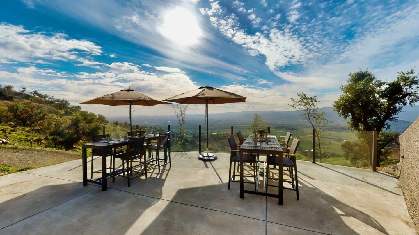 Patio seating overlooking mountain hilltop view