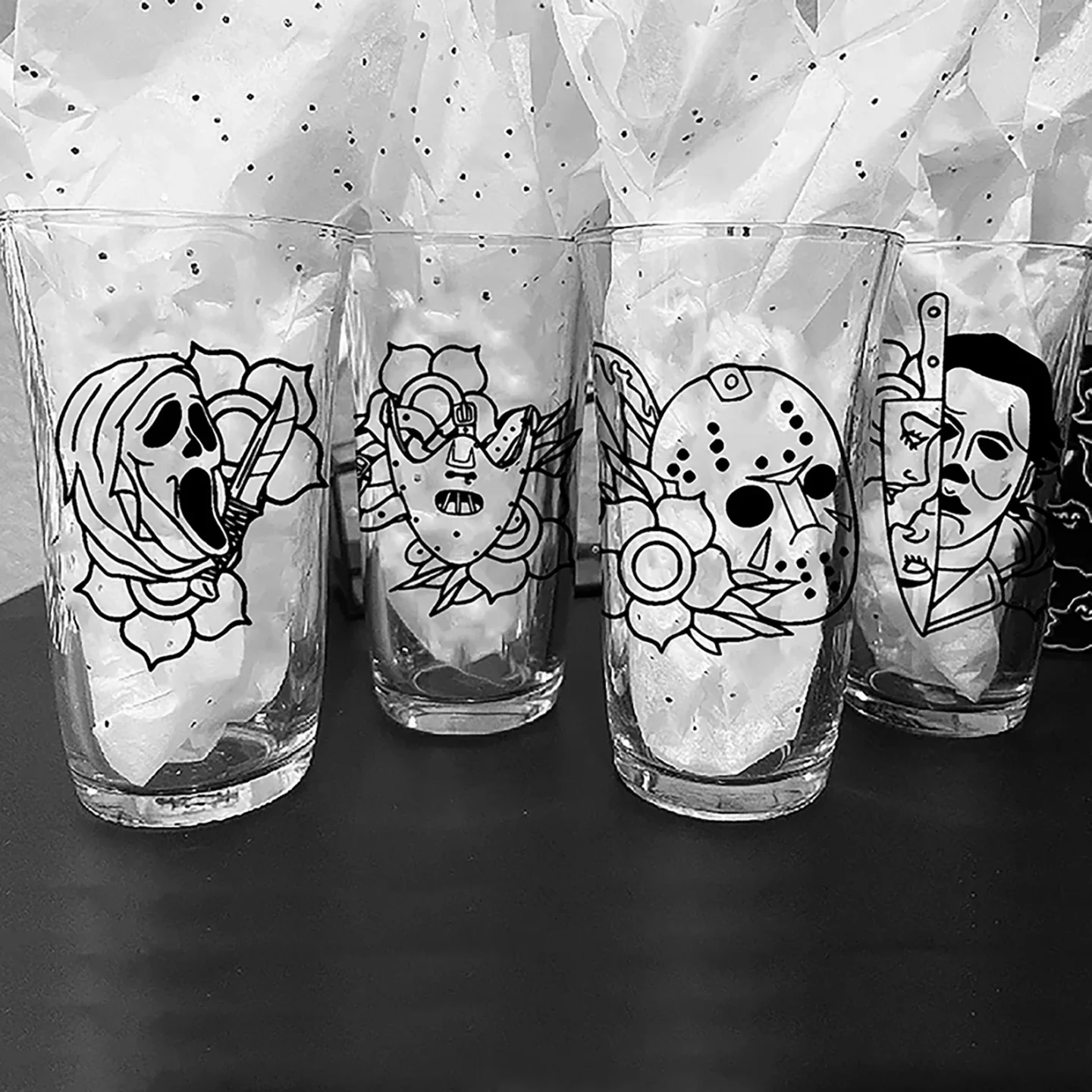 Drawing of horror Movie Icons printed on pint glasses